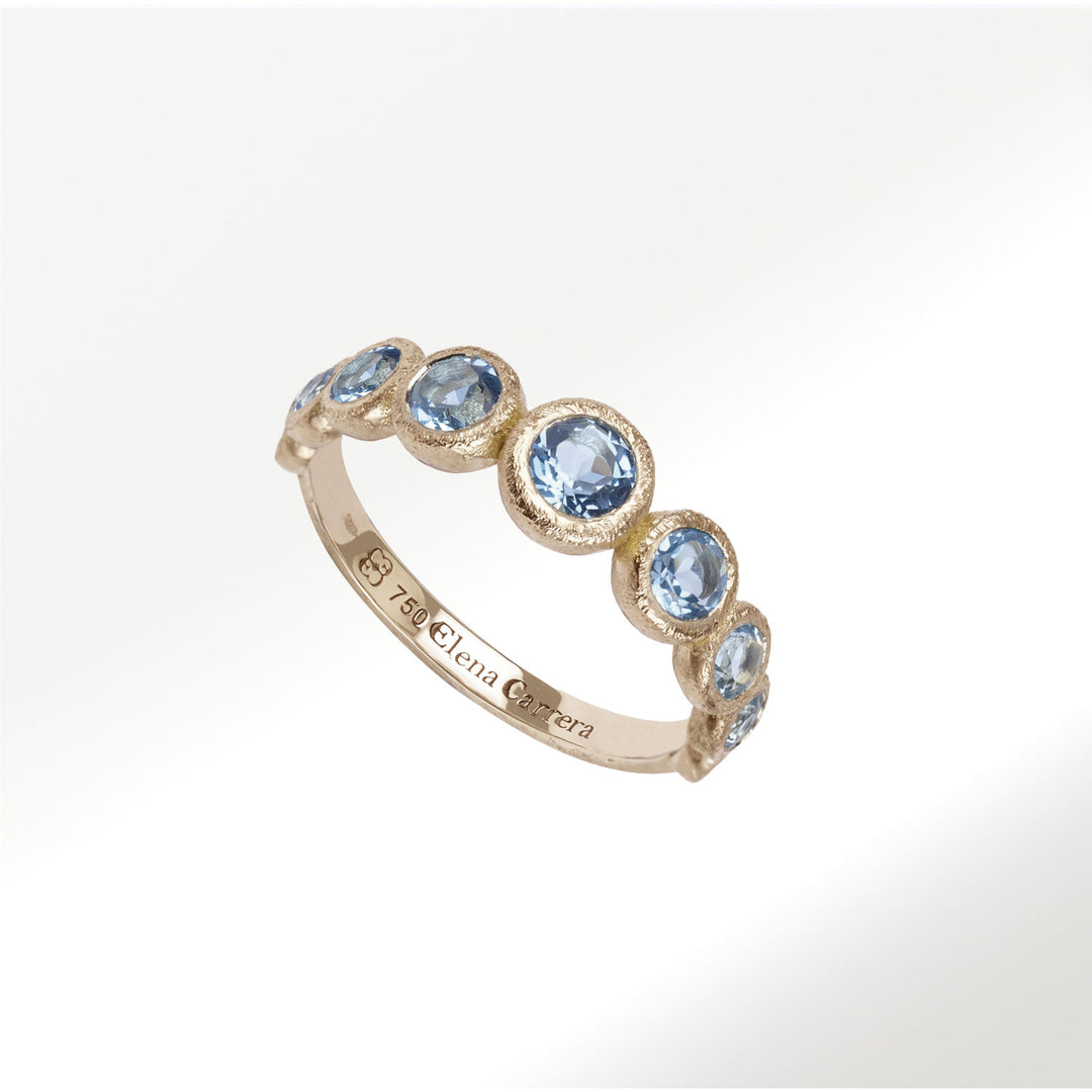 Anillo de la Colección Bubbbles de oro amarillo de 18 quilates y topacios azules by Elena Carrera