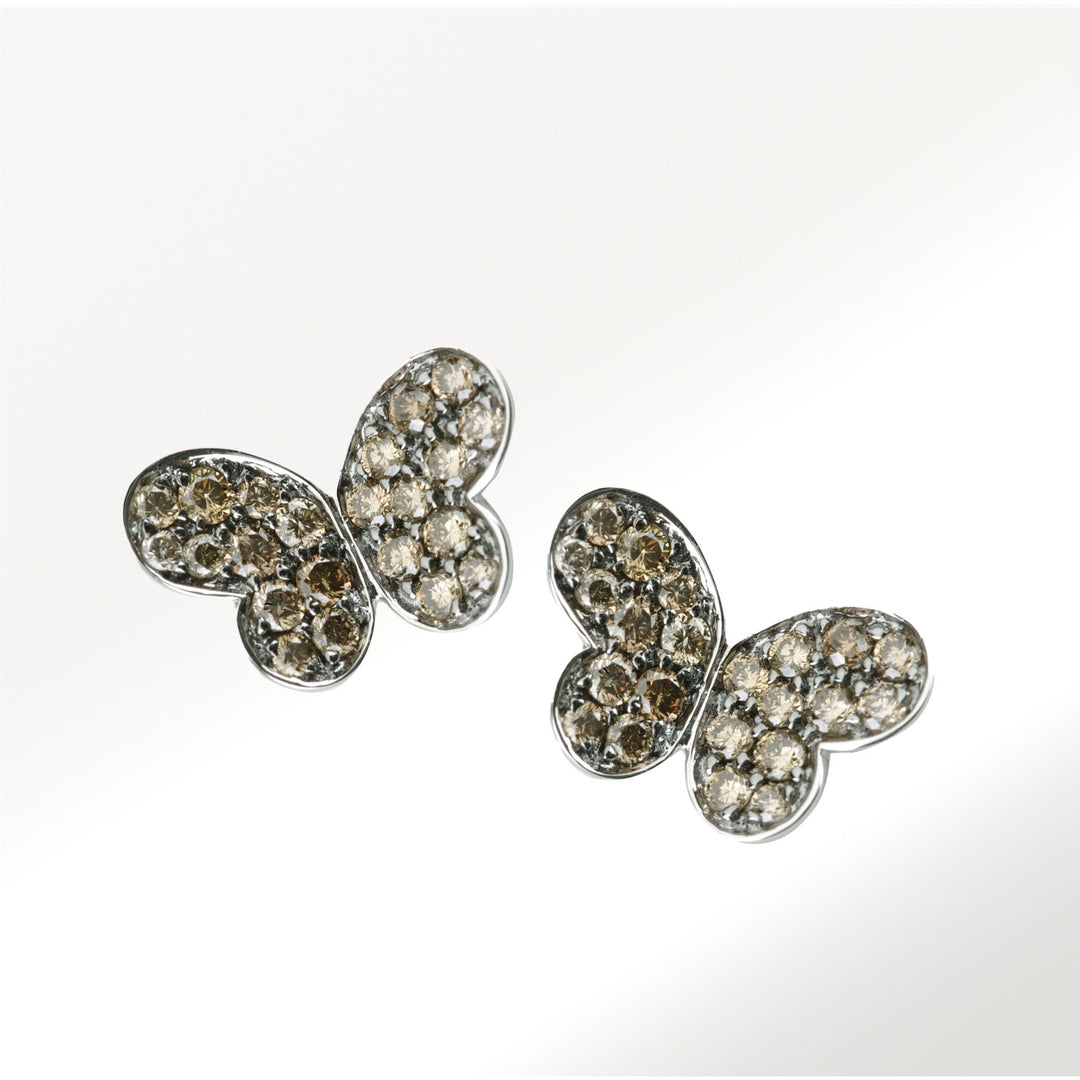 Pendientes medianos de la Colección Mariposas de oro blanco de 18 quilates y diamantes brown de 0’53 quilates By Elena Carrera