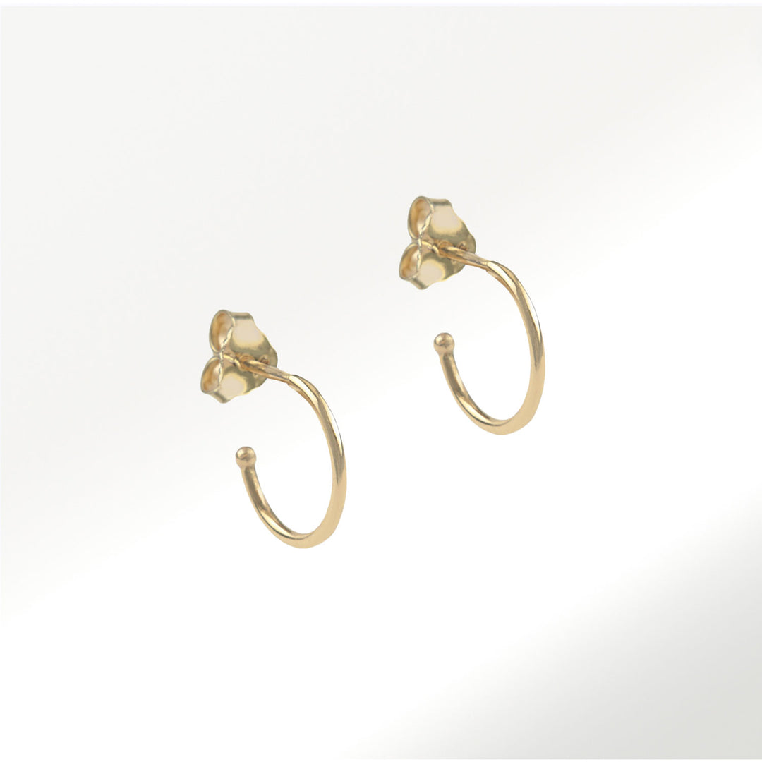 Pendientes 10 mm de la Colección Crazy Hoops de oro amarillo de 18 quilates by Elena Carrera