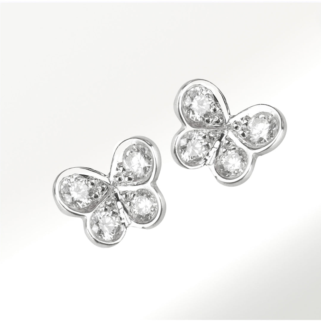 Pendientes mini de la Colección Mariposas de oro blanco de 18 quilates y diamantes by Elena Carrera