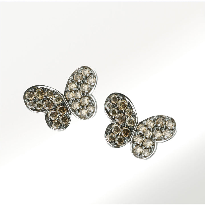 Pendientes medianos de la Colección Mariposas de oro blanco de 18 quilates y diamantes brown de 0’53 quilates By Elena Carrera