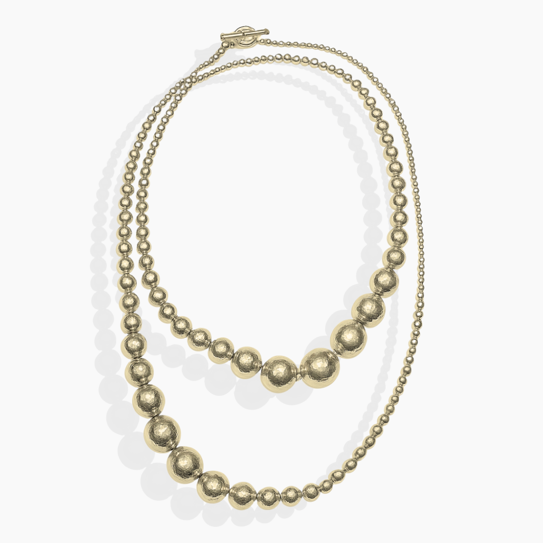 Collar largo de bolas texturadas de plata 925 con baño de oro amarillo 18k By Elena Carrera